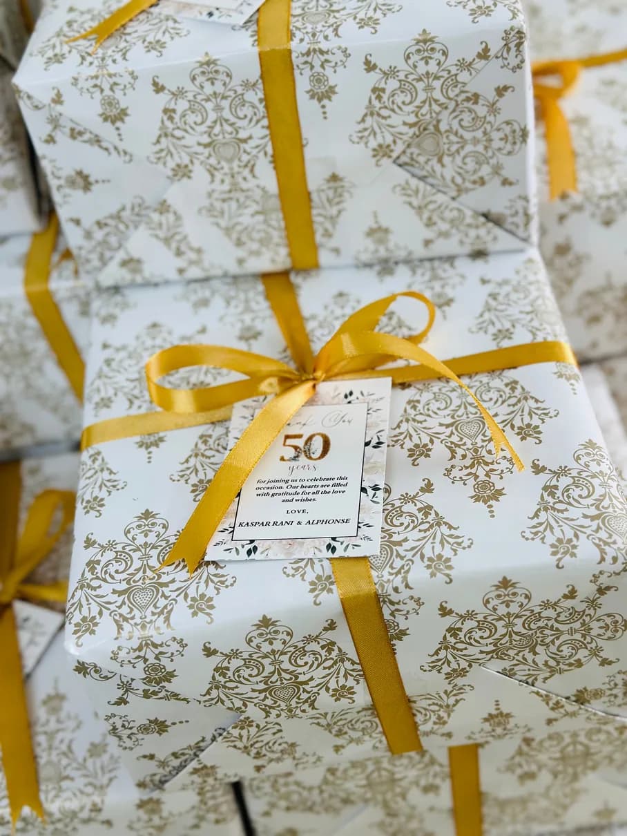 Gold-printed wrapping for a 50th anniversary celebration